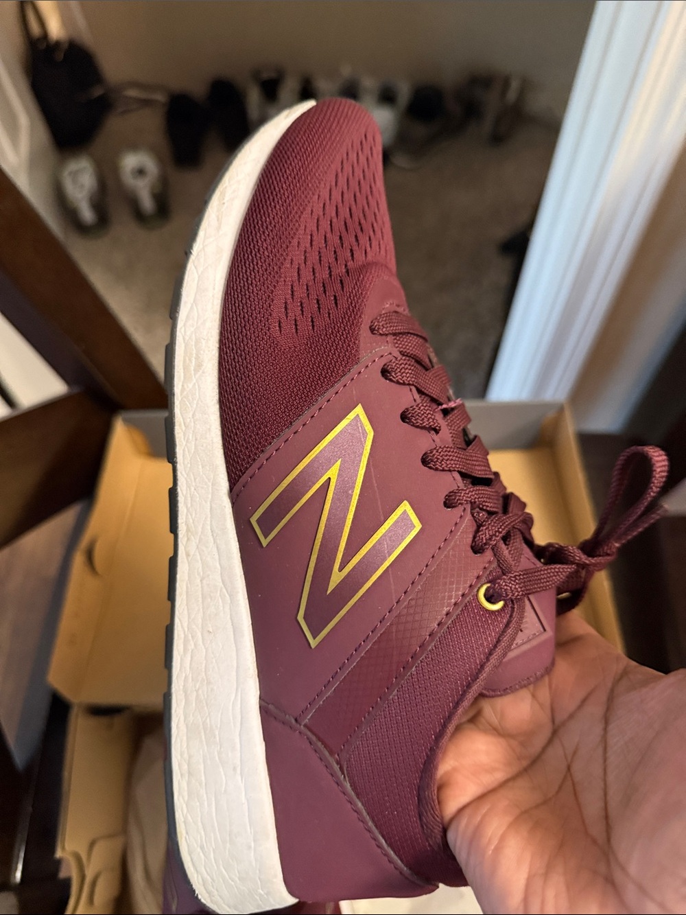 New Balance Men's Maroon Athletic Sneaker with Gold Accent